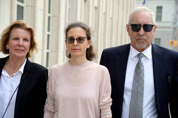 Clare Bronfman, center, in April 2019. Ms. Bronfman is the first defendant to be sentenced in the Nxivm investigation.